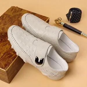 Elegant men's off-white crocodile embossed leather loafers with metallic detail for casual wear