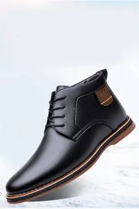 Detailed view of black pebble-grain leather business boots featuring warm winter lining