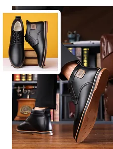 Detailed view of men's black high-top leather business boots with warm fleece lining.