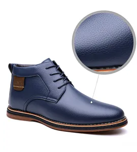 Close-up of blue pebbled leather texture on men's high-top business casual shoe
