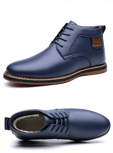 Detailed view of navy blue high-top men's leather boots with warm fleece lining