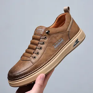 Stylish brown retro leather sneakers for men in a casual flat board shoe design style