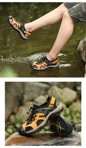 Close-up of breathable men's outdoor sandals in a natural water stream setting