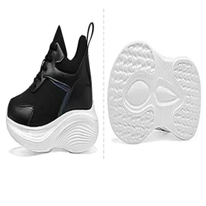 Detailed view of black mesh platform sneakers with 10cm hidden wedge and white sole