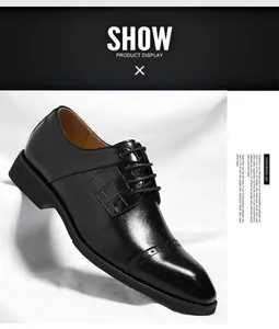Zijaanzicht van elegante zwarte lederen zakelijke schoenen met krokodillentextuur