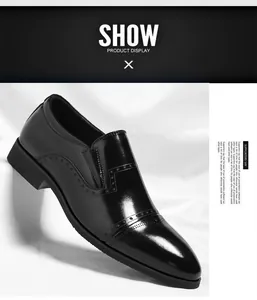 Detailed view of black men's slip-on business formal leather shoes with brogue pattern