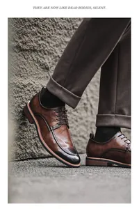 Professional shot of brown leather business shoes with an elegant burnished toe detail.