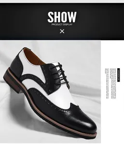 Detailopname van klassieke zwart-witte heren Brogue schoenen in zakelijke stijl