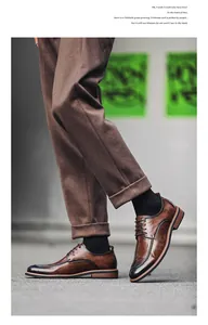 Close-up detail of brown men's leather derby shoes with elegant burnished finish and laces