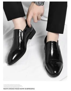 Polished black men's pointed-toe formal slip-on shoes in British style
