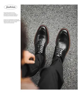 High-angle POV of glossy black leather men's formal business shoes on asphalt texture