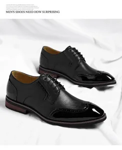 Detailed shot of black men's brogue shoes featuring glossy wingtip and matte leather.