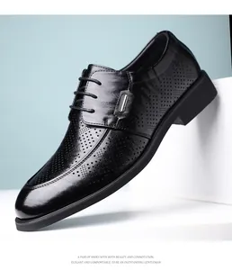 Close-up of premium black hollow-out business dress shoe with elegant lace-up design
