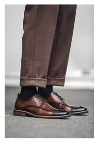 Close-up of brown mens leather derby shoes with vintage hand-burnished finish