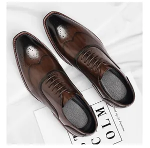 Detailed view of brown leather brogue shoes with elegant wingtip perforation