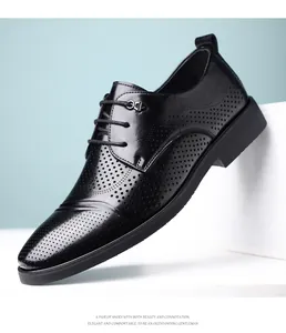 Detailed macro view of black breathable leather Derby shoes with brogue perforations