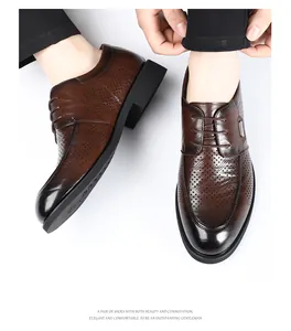 Detailed view of brown perforated men's dress shoes with vintage hand-rubbed finish