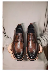 Detailed view of men's brown burnished leather business dress shoes with lace-up