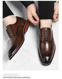 Elegant men's brown burnished leather business dress shoes with brogue details