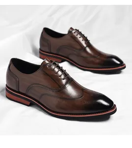 Detailed view of classic brown leather men's oxford brogue shoes with burnished toe detail