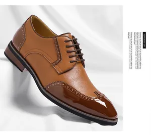 Detailed view of brown leather brogue shoe with wingtip design and lace-up closure.