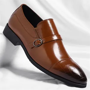 Elegant men's brown leather monk strap dress shoes with embossed crocodile texture