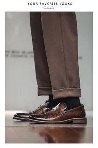 Professional close-up showing the side detail of men's vintage brown leather slip-on loafers