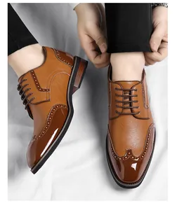 Detail view of brown men's Brogue shoes with elegant decorative perforations and laces