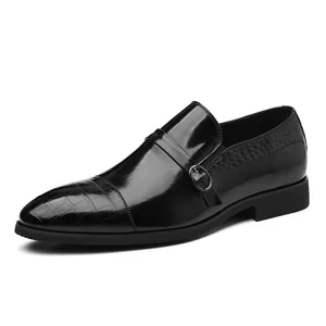Classic black men's business dress shoes with crocodile texture and monk strap