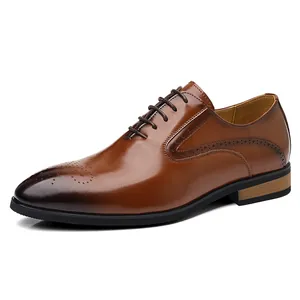 Classic brown men's Oxford dress shoes with elegant brogue detailing and lace-up design.