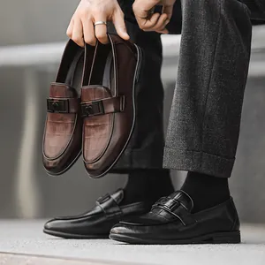 Premium British style men's leather loafers in brown and black colors with slip-on design