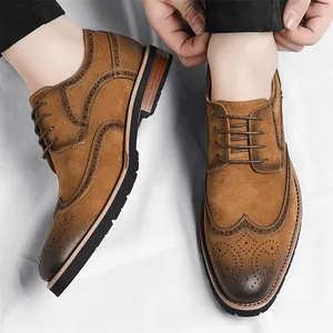 Classic men's brown suede brogue derby shoes with elegant wingtip carved detailing