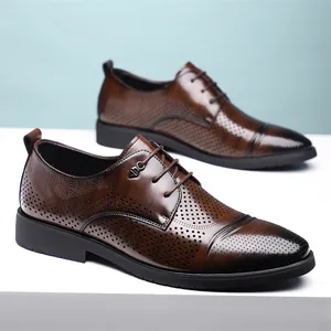 Elegant brown leather Derby shoes with brogue detailing and gradient toe for business