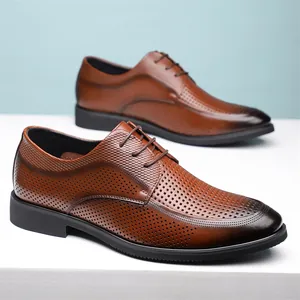 Men's brown perforated business dress shoes with lace-up design and breathable holes.