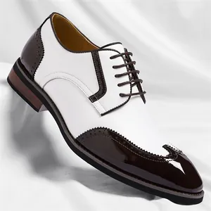 Elegant men's white and dark brown brogue oxfords for formal business dress occasions