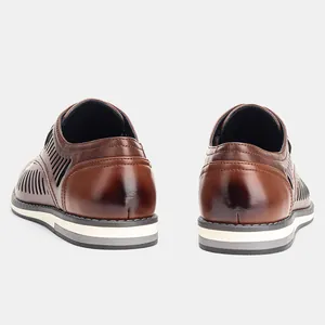 Rear view of brown hollow breathable leather shoes with stylish multi-layer sole