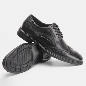 Detailed view of black leather Brogue shoes showing side profile and non-slip sole