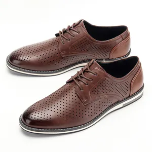 Classic brown perforated leather dress shoes for men featuring breathable hollow design