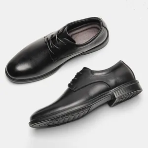 Detail view of premium black leather men's Derby shoes showing side profile and sole