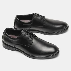 Side view detail of classic black leather Derby dress shoes for office and weddings