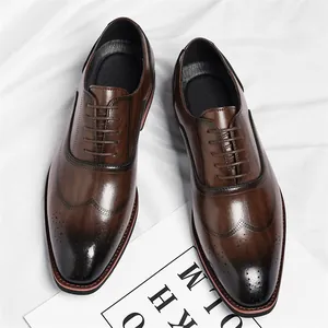 Elegant vintage burnished brown wingtip brogue dress shoes with lace-up design for men