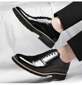 Detail of black cap-toe Oxford shoes for men in a professional business style.