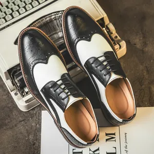 Klassische schwarz-weiße Brogue-Flügelkappenschuhe für Herren für formelle Anlässe