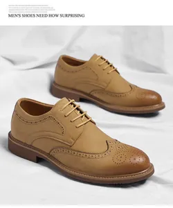 Classic men's tan Brogue dress shoes with wingtip perforation detail