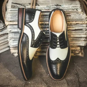 Klassische Herren Brogue-Schuhe in Schwarz-Weiß mit Schnürung im edlen Wingtip-Design