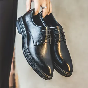 Elegant men's formal black leather business shoes with stylish crocodile skin texture
