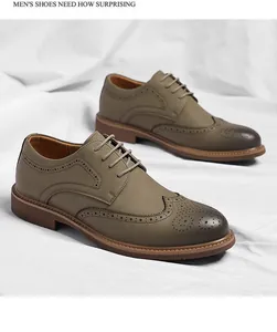 Detailed side view of olive green Brogue business shoes with intricate perforated carvings