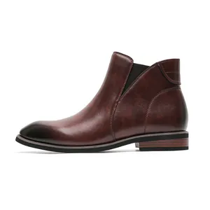 Side view of classic brown men's Chelsea boots with a gradient toe and wooden-style heel.