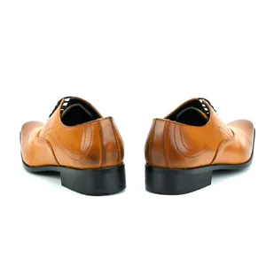 Rear perspective of elegant brown men's business dress shoes with textured pattern