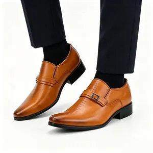 Detail view of men's brown leather business loafers with buckle strap design